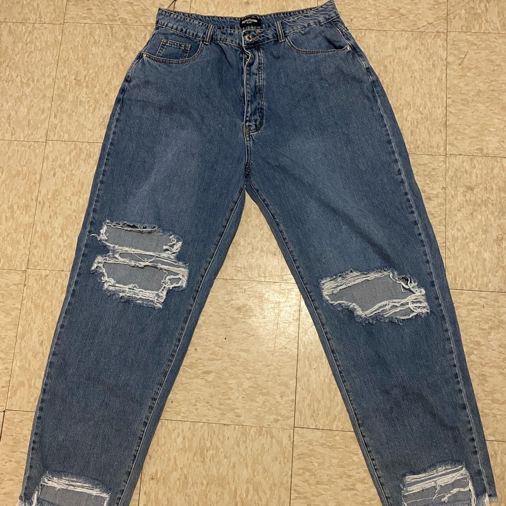 Mid blue wash extreme ripped hem
boyfriend jeans from Pretty Little Thing